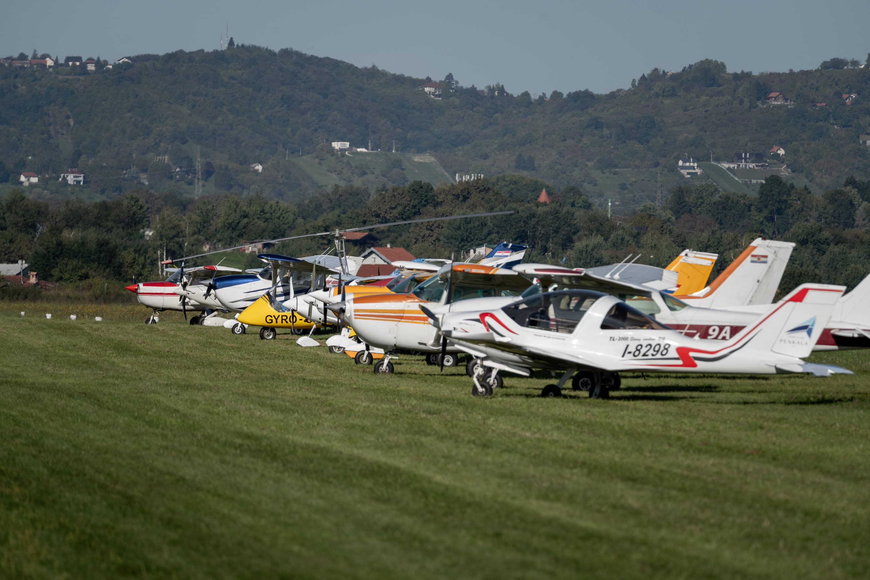 Hero background photo — jets over Zagreb